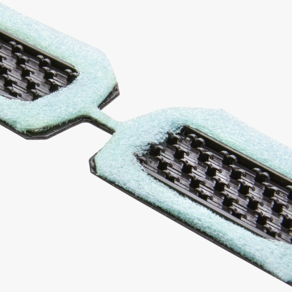 Low profile hook and loop for transportation seating